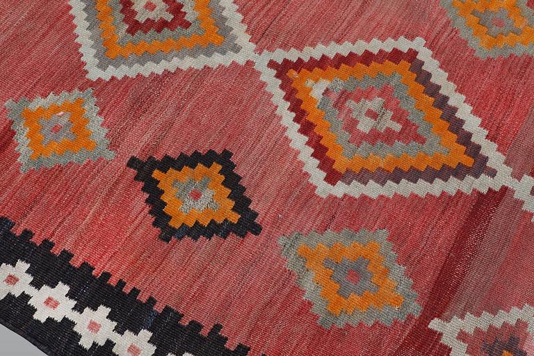 A kurdish nomad kilim, ca 277 x 138 cm.