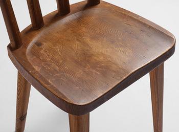 Axel Einar Hjorth, a set of six stained pine "Utö" chairs, Nordiska Kompaniet, Sweden, 1930s.