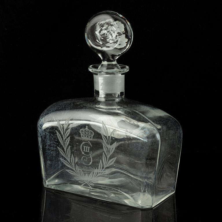 A set of 11 wine glasses and a bottle with stopper, 1900-tal.