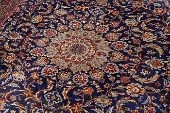 An oriental carpet, c. 390 x 295 cm.