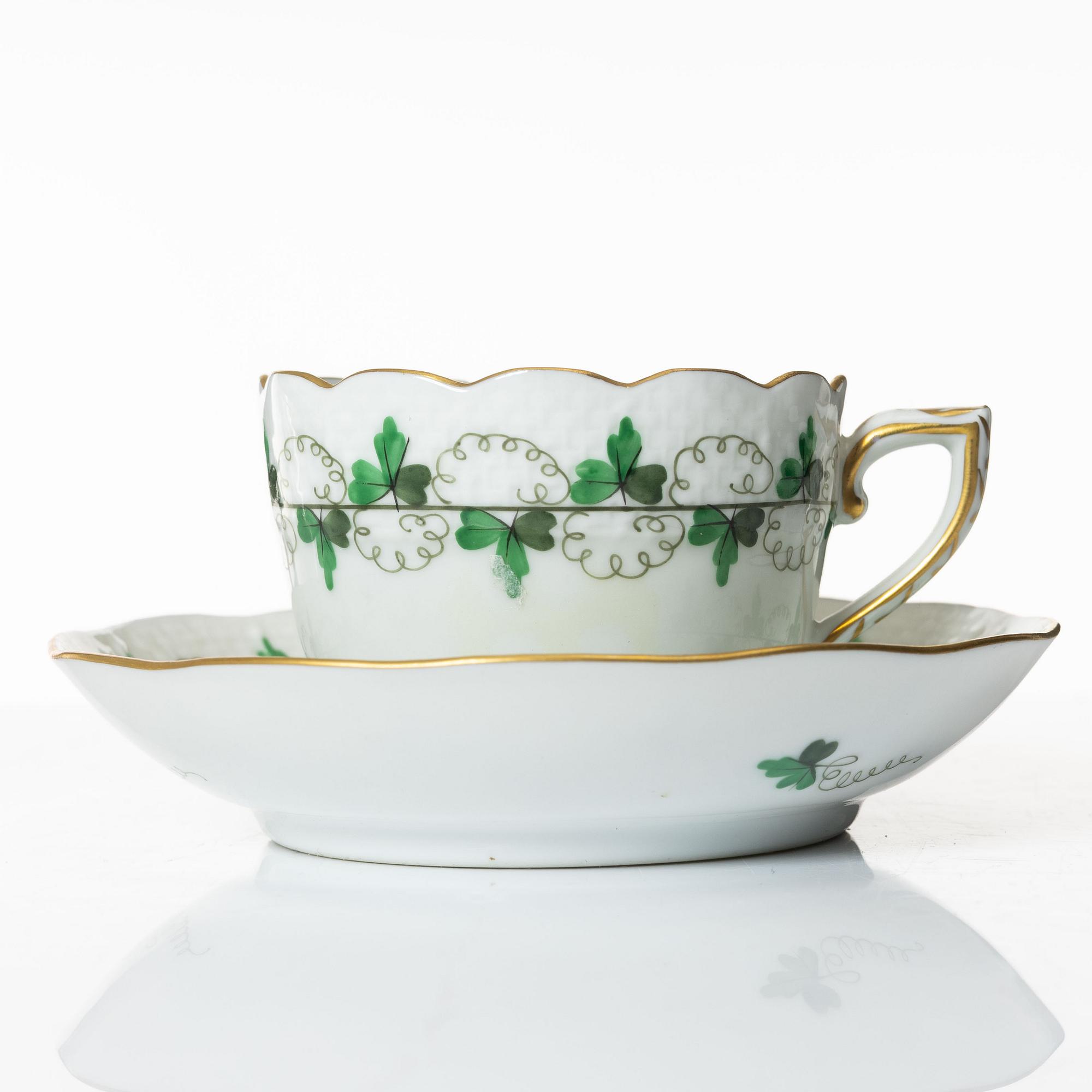 A 42-piece 'Chinese Bouquet' porcelain service and six 'Waldstein rose' coffee cups with saucers, Herend, Hungary.