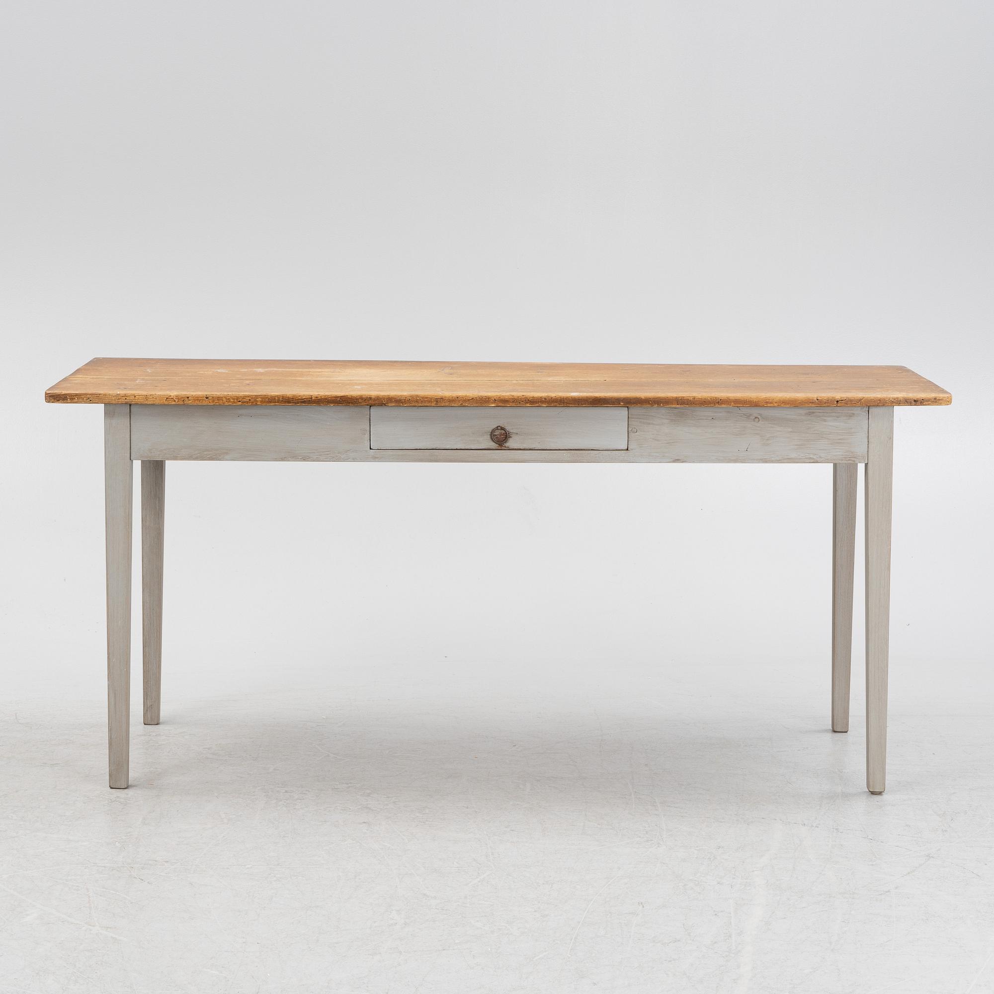 A painted pine table, contemporary with older parts.