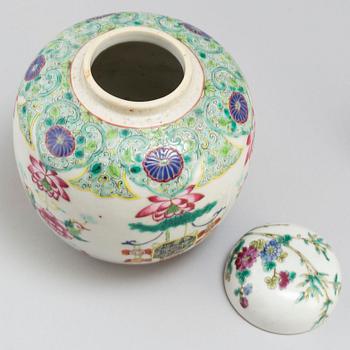 A famille rose trumpet vase, a jar with cover, Qing dynasty, 18th century.