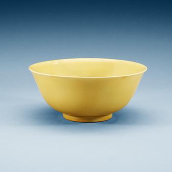 1391. A yellow glazed bowl, Ming dynasty, with Jiajings six character mark and of the period (1522-66).