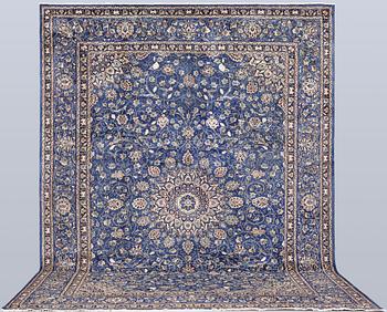 A Kashmar carpet, 408 x 307 cm.