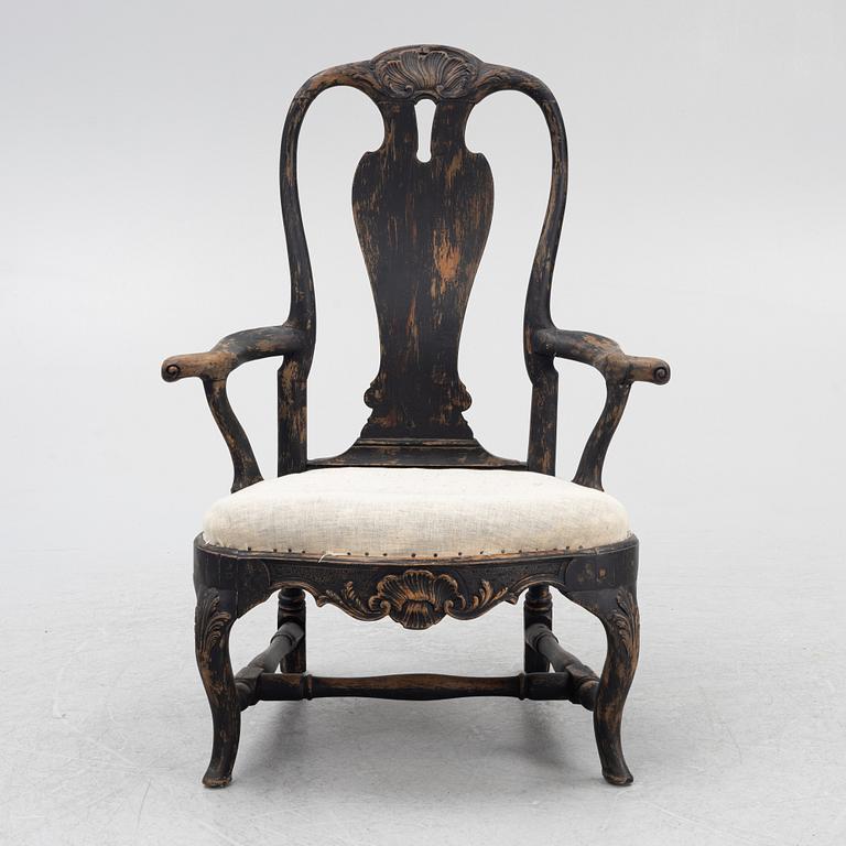 A Rococo armchair, later part of the 18th Century.
