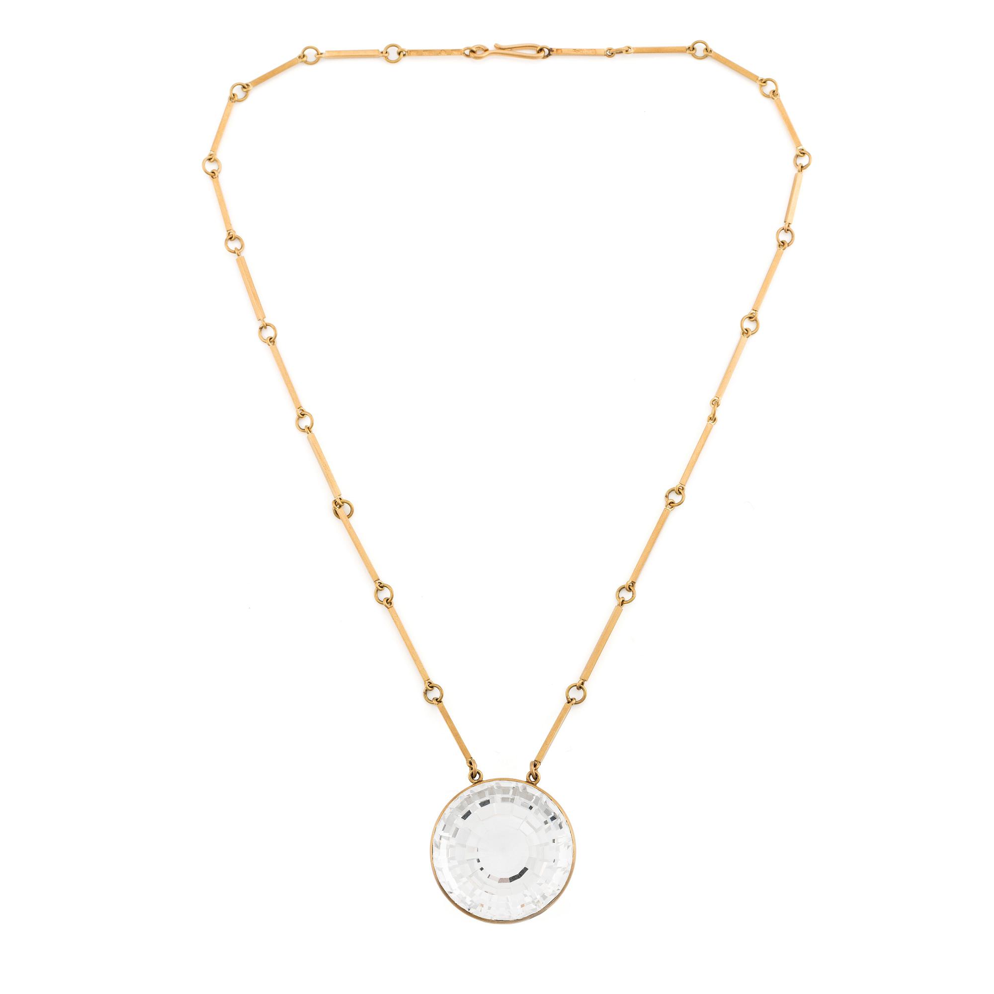 Wiwen Nilsson, an 18K gold necklace with a rock crystal pendant, Lund 1975.