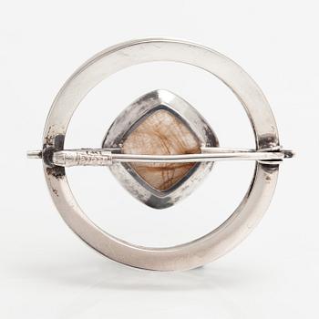 Elis Kauppi, A silver brooch/pendant with a rutile quartz. Kupittaan kulta, Turku 1961.