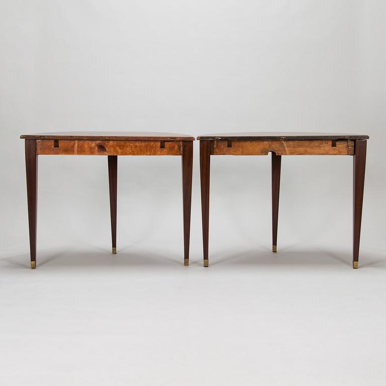 Two half-moon shaped tables from 19th century.