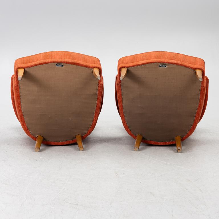 Carl Malmsten, a pair of "Farmor" armchairs, O.H.Sjögren, Sweden, later part of the 20th century.
