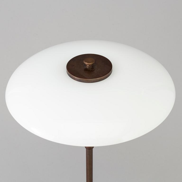 POUL HENNINGSEN, a 'PH-3/2' glass and copper table light from Louis Poulsen.