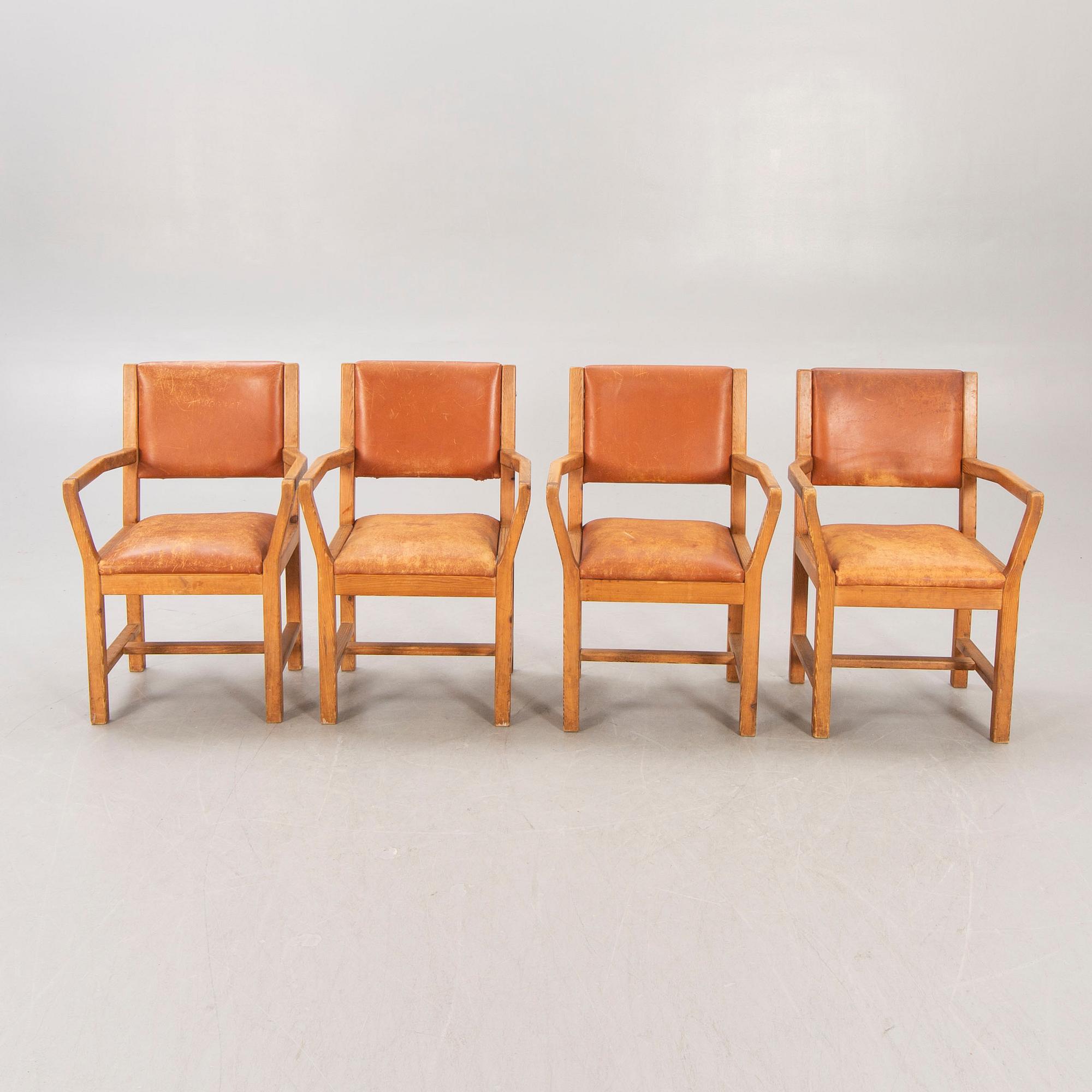 A set of four 1970:s Tage Poulsen Daumiller oak and leather armchairs for GM Möbler Denmark.