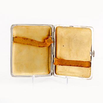 An early 1900s silver and enamel cigarette case, weight 162 grams.