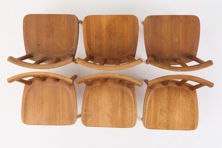 Axel Einar Hjorth, a set of six stained pine "Utö" chairs, Nordiska Kompaniet, Sweden, 1930s.