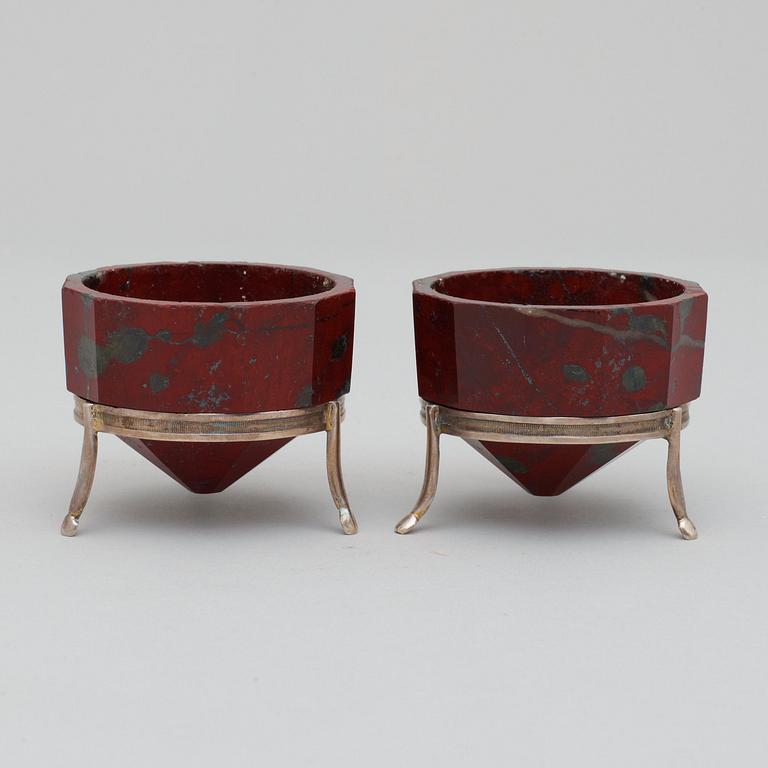 A pair of Swedish early 19th century iron-silicon salts. Silver stands with maker's mark J. H. Leffler, Falun 1817.