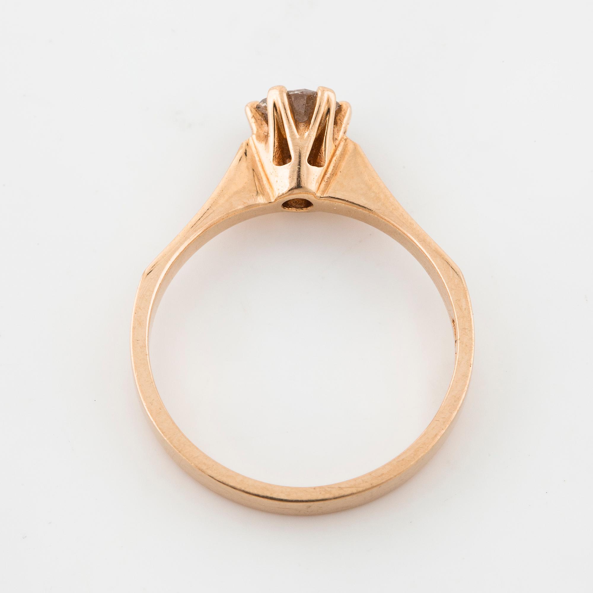 A brilliant cut diamond ring.