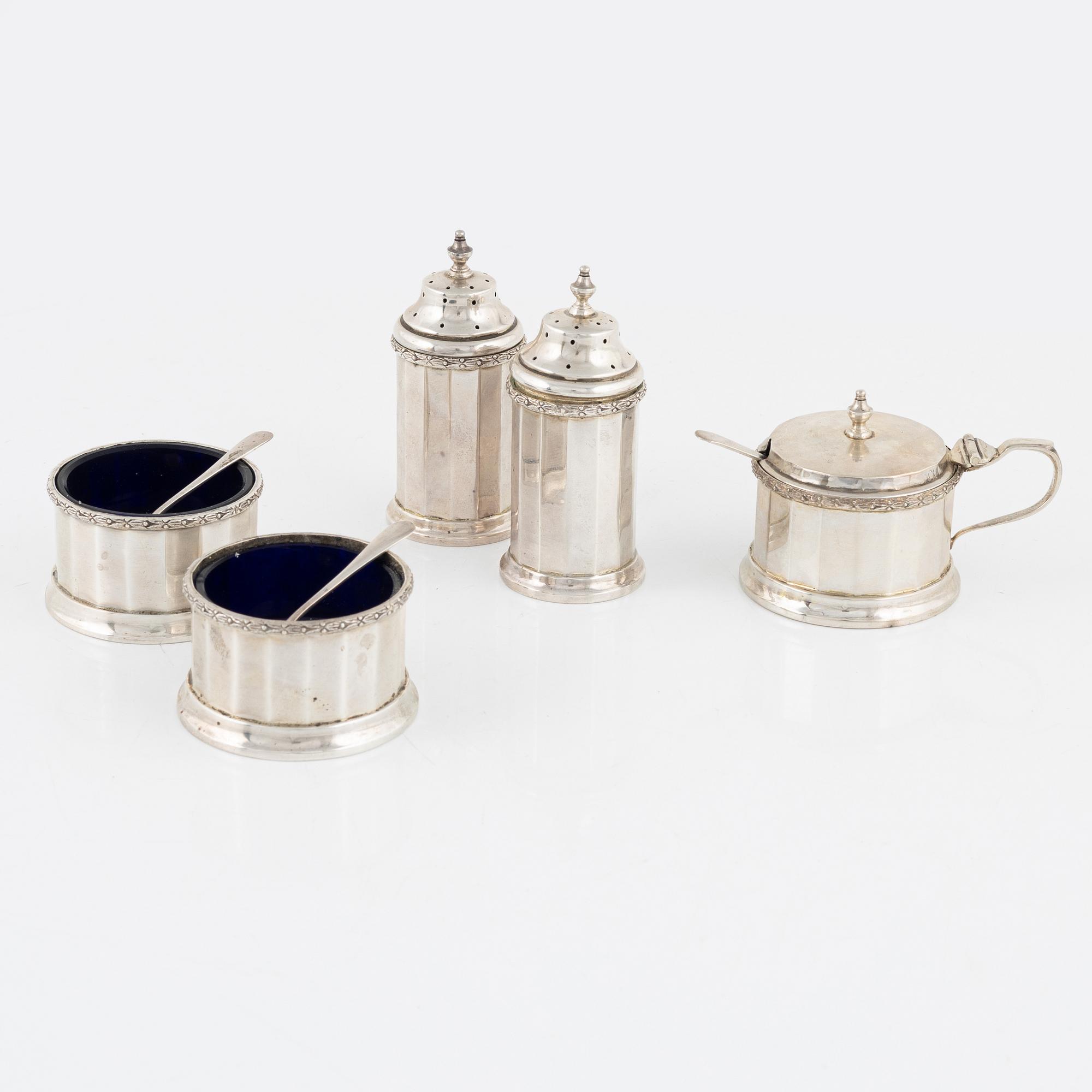 William Neale & Son Ltd, a 7-piece silver spice set, Birmingham, England, 1931.