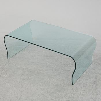 A mid 20th Century glass coffee table.