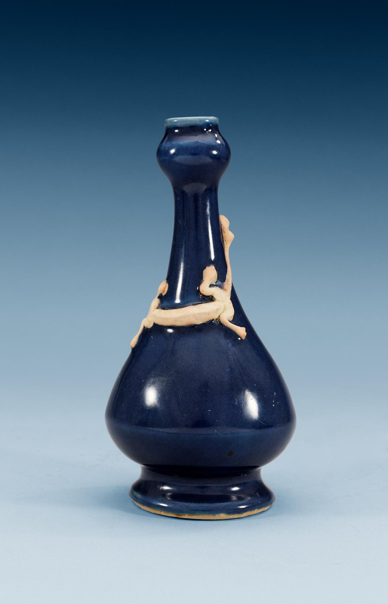 A blue glazed vase with a qilin, Qing dynasty (1644-1912).