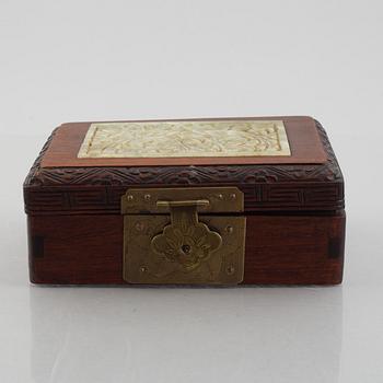 Two Chinese hardwood boxes with nephrite plaques, 20th century.