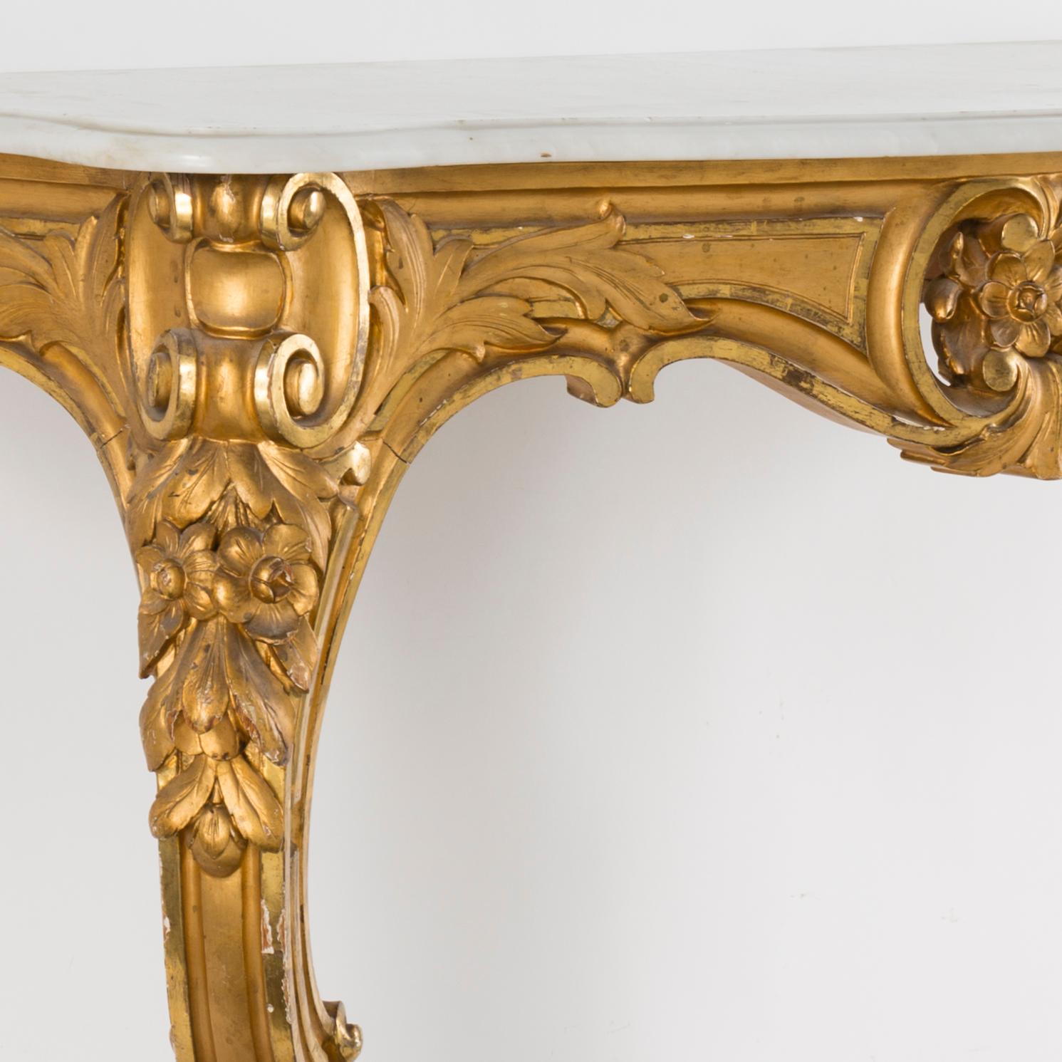 A gilt wood mirror and marble top console table, early 20th Century.