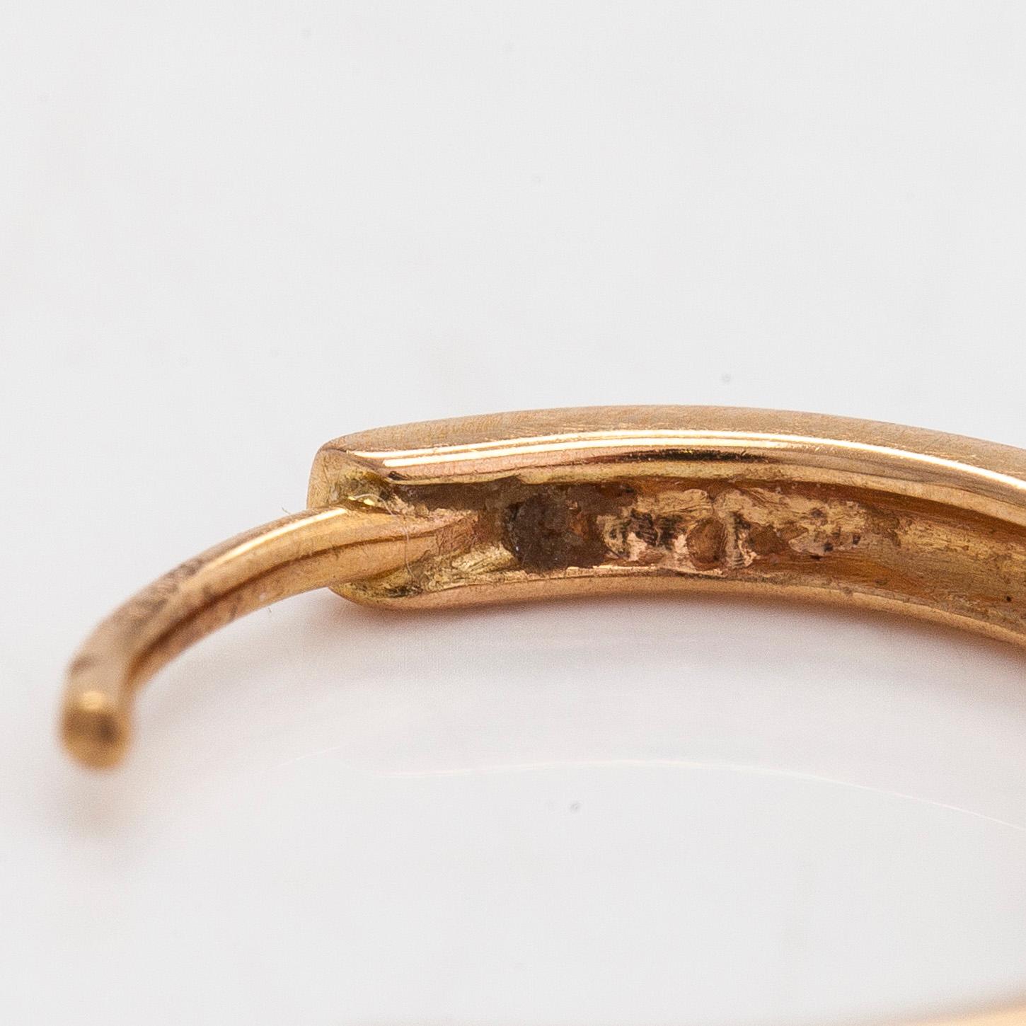Korvakorut, 18K kultaa, timantteja yht. n 0.22 ct.