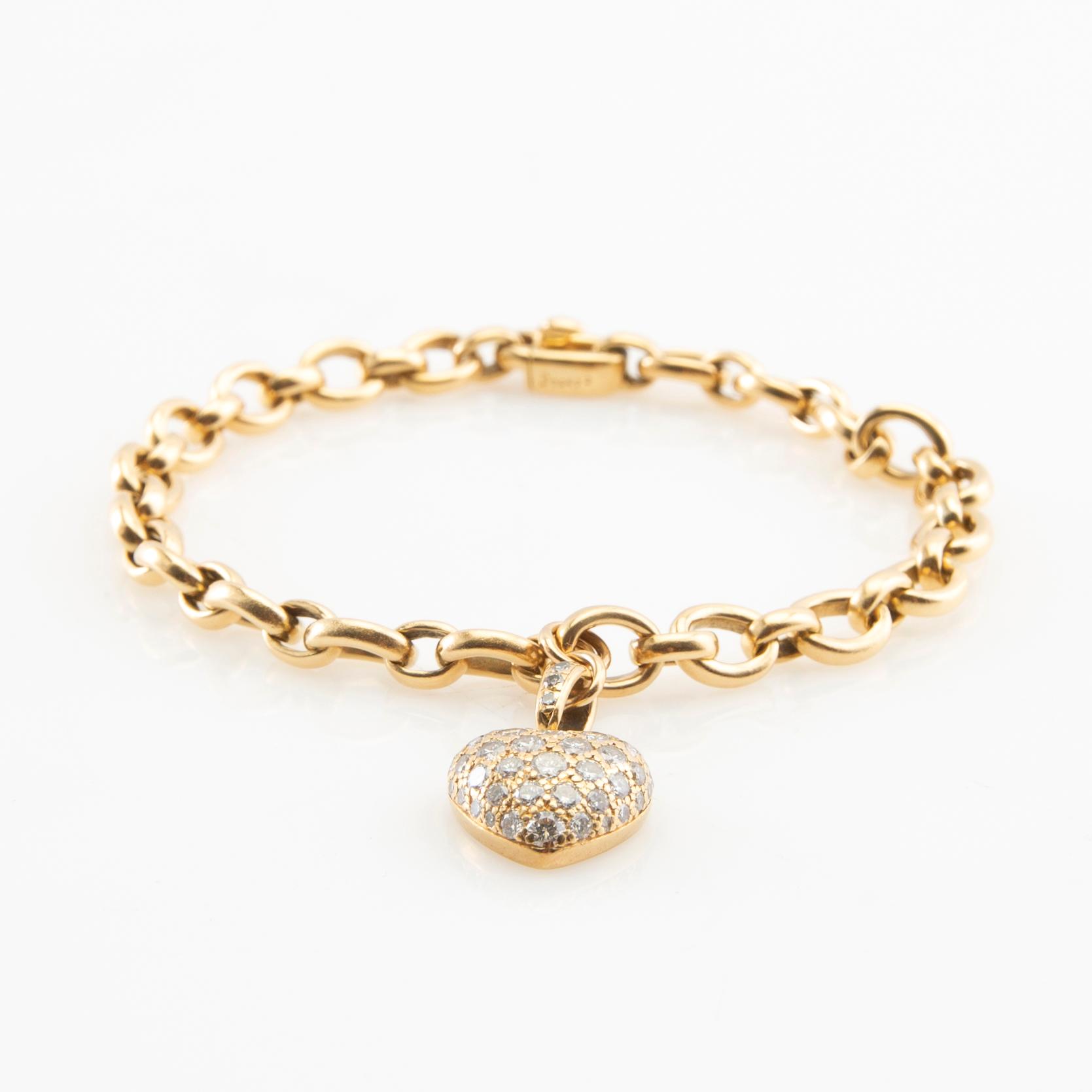 Cartier, Armband av 18K guld med runda briljantslipade diamanter.