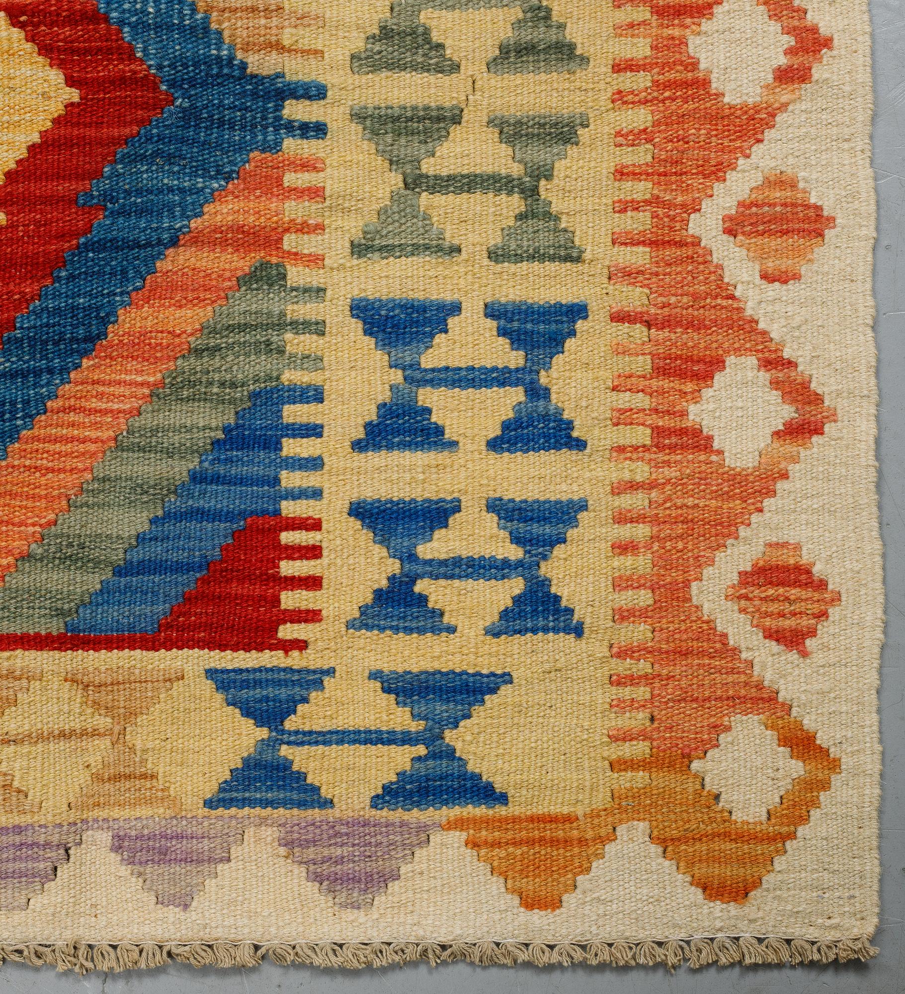 A carpet, kilim, 226 x 171 cm.