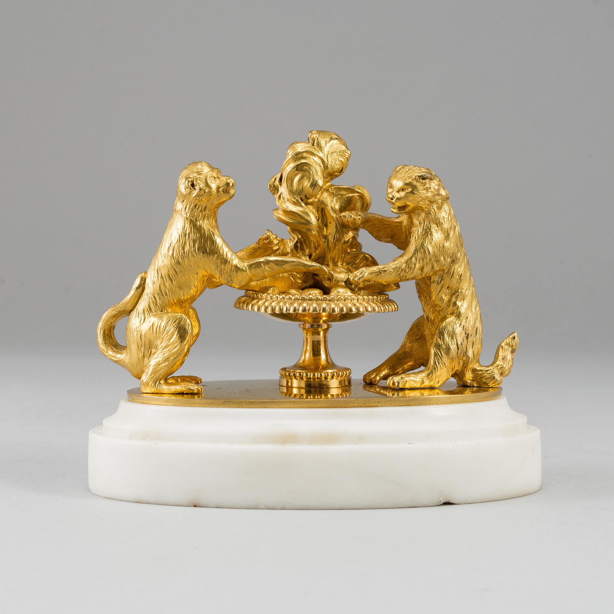 An ormolu and marble paperweight, France, first half of the 19th century.