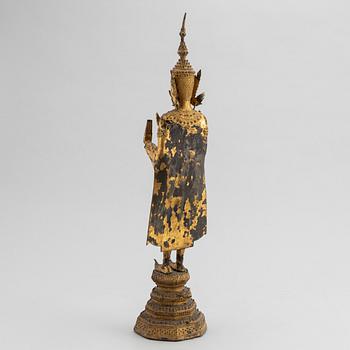 A Thai gilt bronze of standing Buddha Sakyamuni, 19th Century.