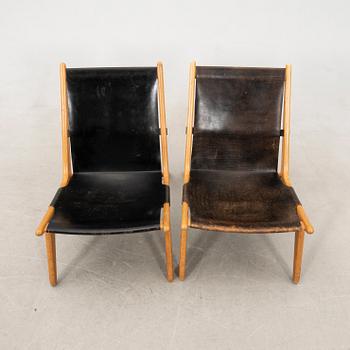 Östen Kristiansson armchairs, a pair of "Jaktstol/Vilstol 204" Luxus, Vittsjö, second half of the 20th century.