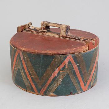 a painted wooden box from the 19th century.