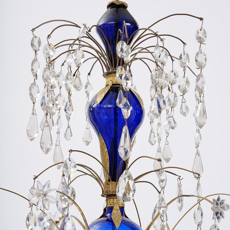 A Russian / Northern European Louis XVI-style gilt brass and blue glass six-branch chandelier, 19th century.