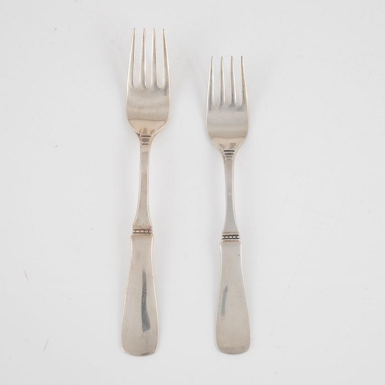 Eric Löfman, an 80-piece Swedish silver cutlery service, model 'Uppsala', MGAB, Lidköping, including 1977.