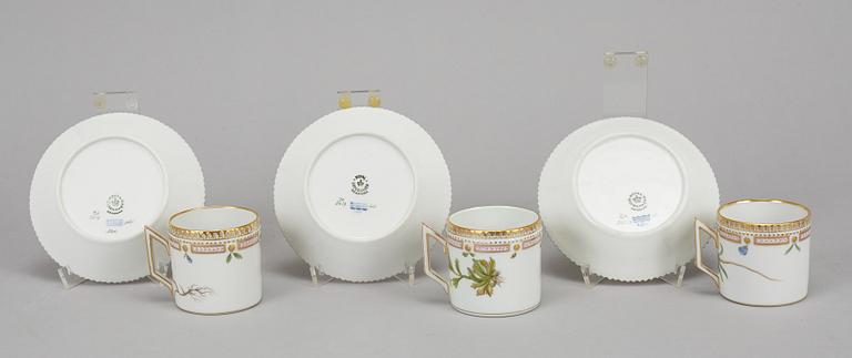 A set of three plus one porcelain "Flora Danica" coffee cups and saucers, "Royal Copenhagen, Denmark.