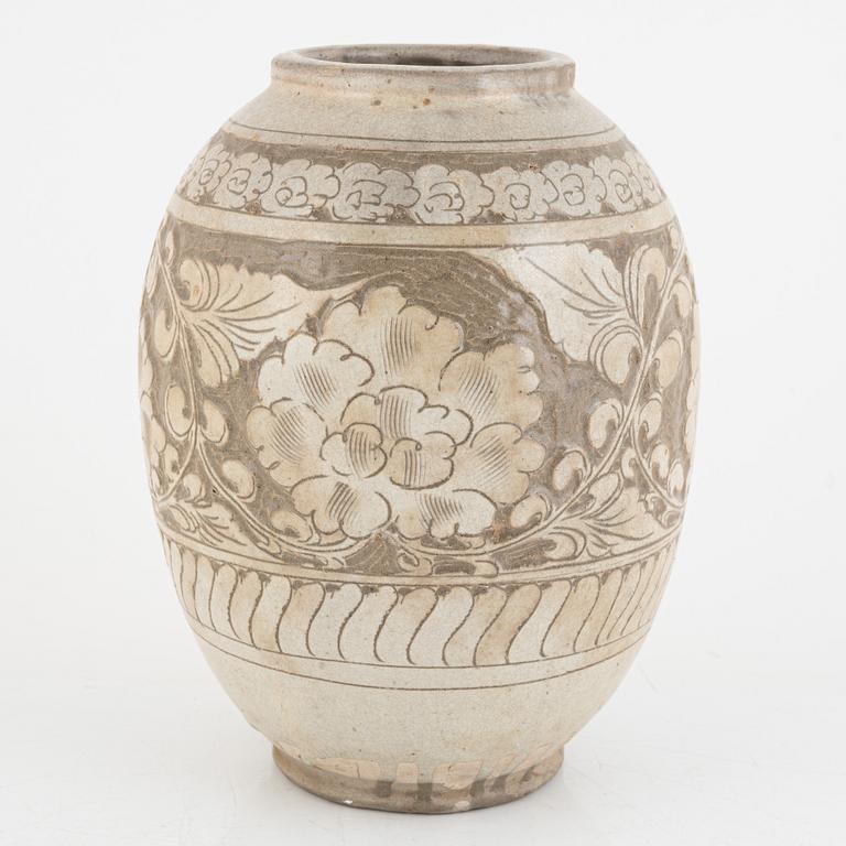 A Chinese glazed stoneware jar, probably Ming dynasty (1368–1644).