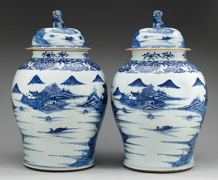 A pair of large blue and white palace jars with covers, Qing dynasty, Qianlong (1736-95).