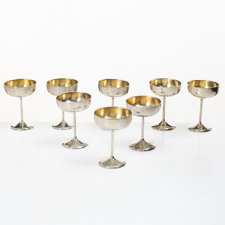 Champagne goblets, 8 similar, silver, including CG Hallberg, Stockholm, 1930.