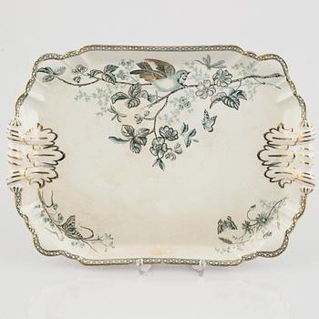 A 124-piece creamware dinner service, "Wexiö guld", Gustavsberg, Sweden, around 1900.