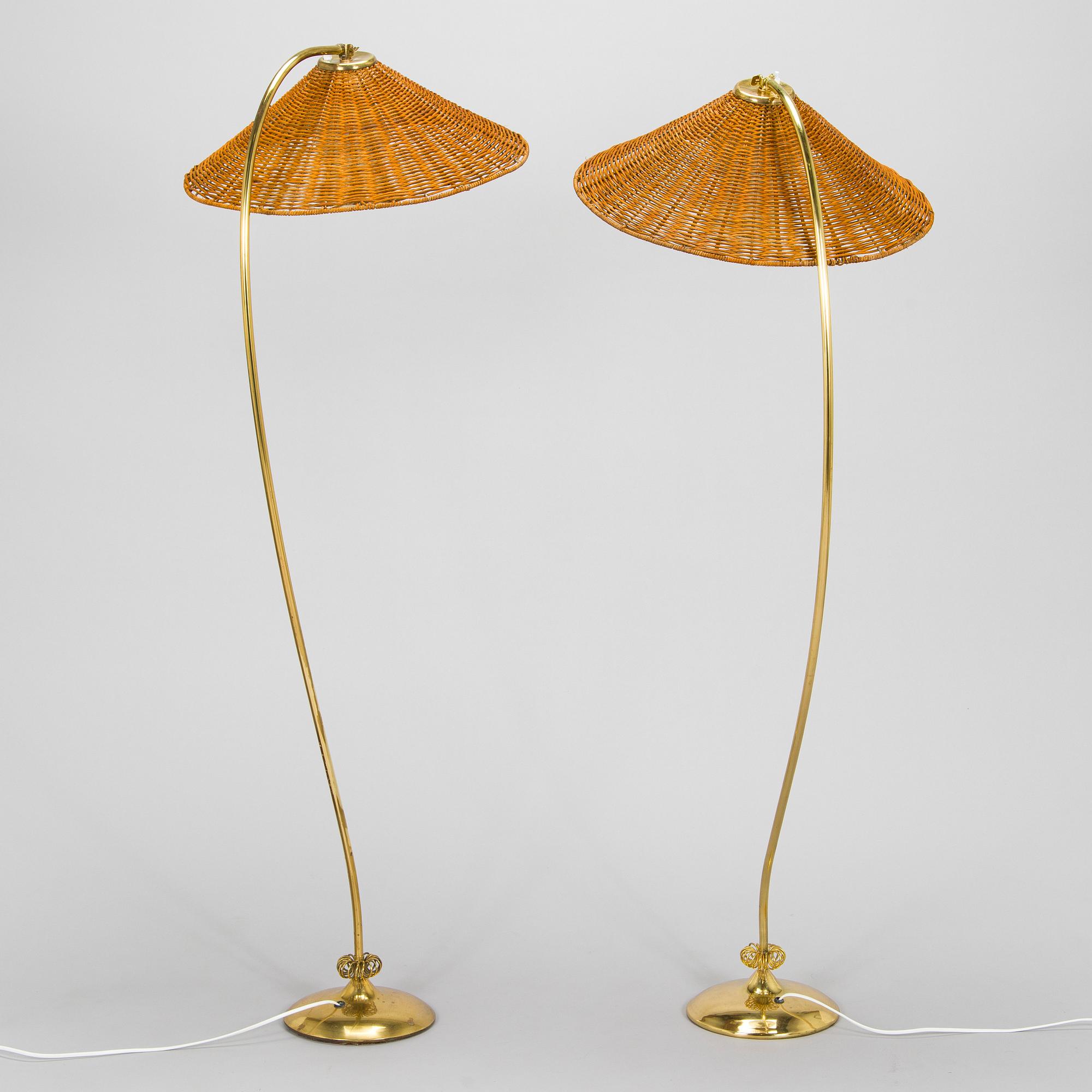 A pair of mid-20th century floor lamps.