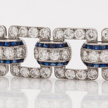 An Art Deco step cut sapphire and  old- cut diamond bracelet.