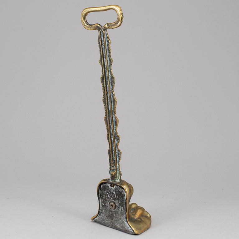 A 19th century bronze door stop.