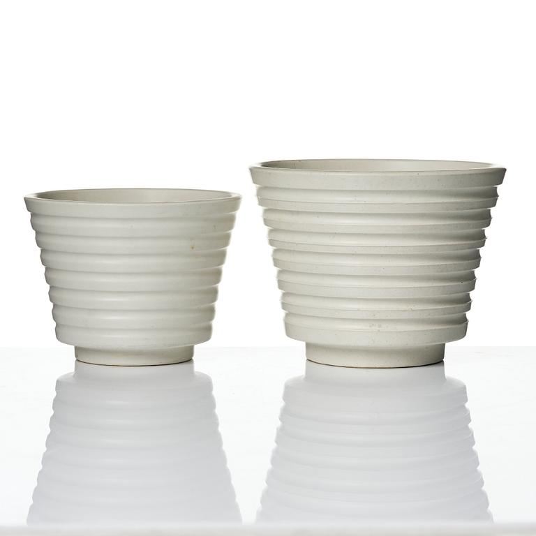 Wilhelm Kåge, A set of three ceramic flower pots, a vase and jar with lid,  Gustavsberg 1930s.