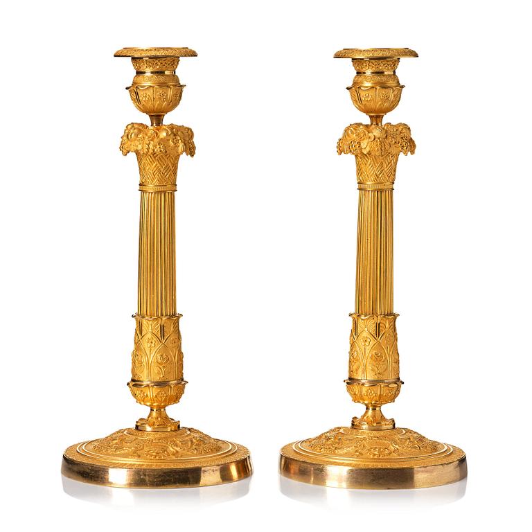 A pair of French Empire candlesticks, beginning of the 1800's.