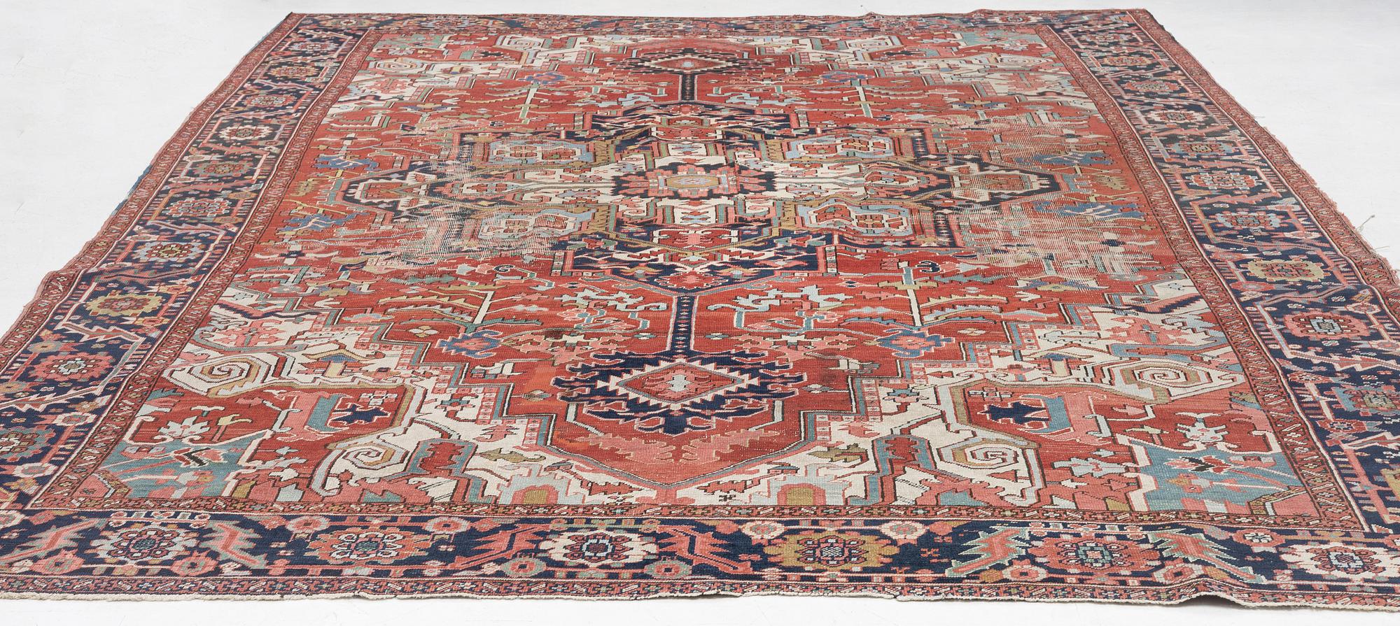 An Antique Heriz carpet, north west persia, c. 420 x 210 cm.