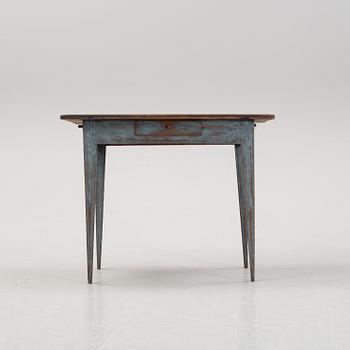 A mid 19th Century table with a drawer.