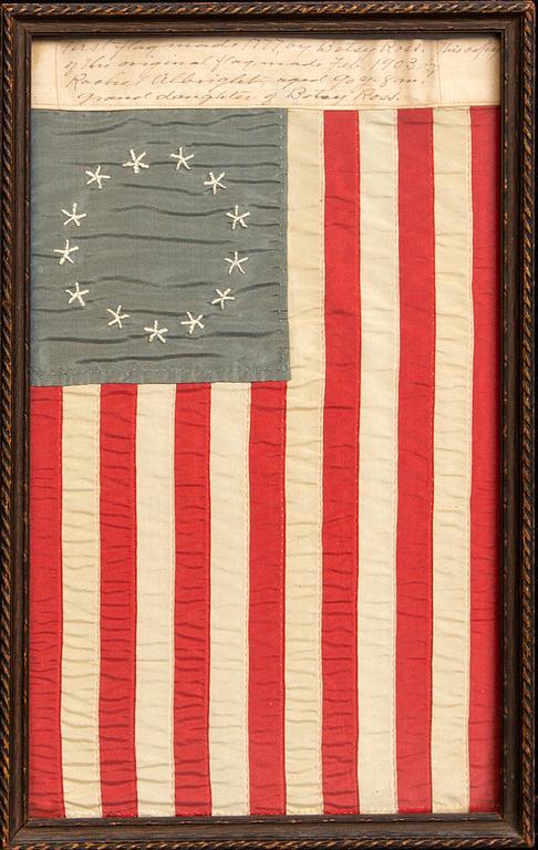 An 13 star American national flag made by Granddaughter of Betsy Ross, Rachel Albright in Feb 1903.