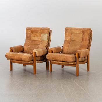 A pair of 1970's armchairs.