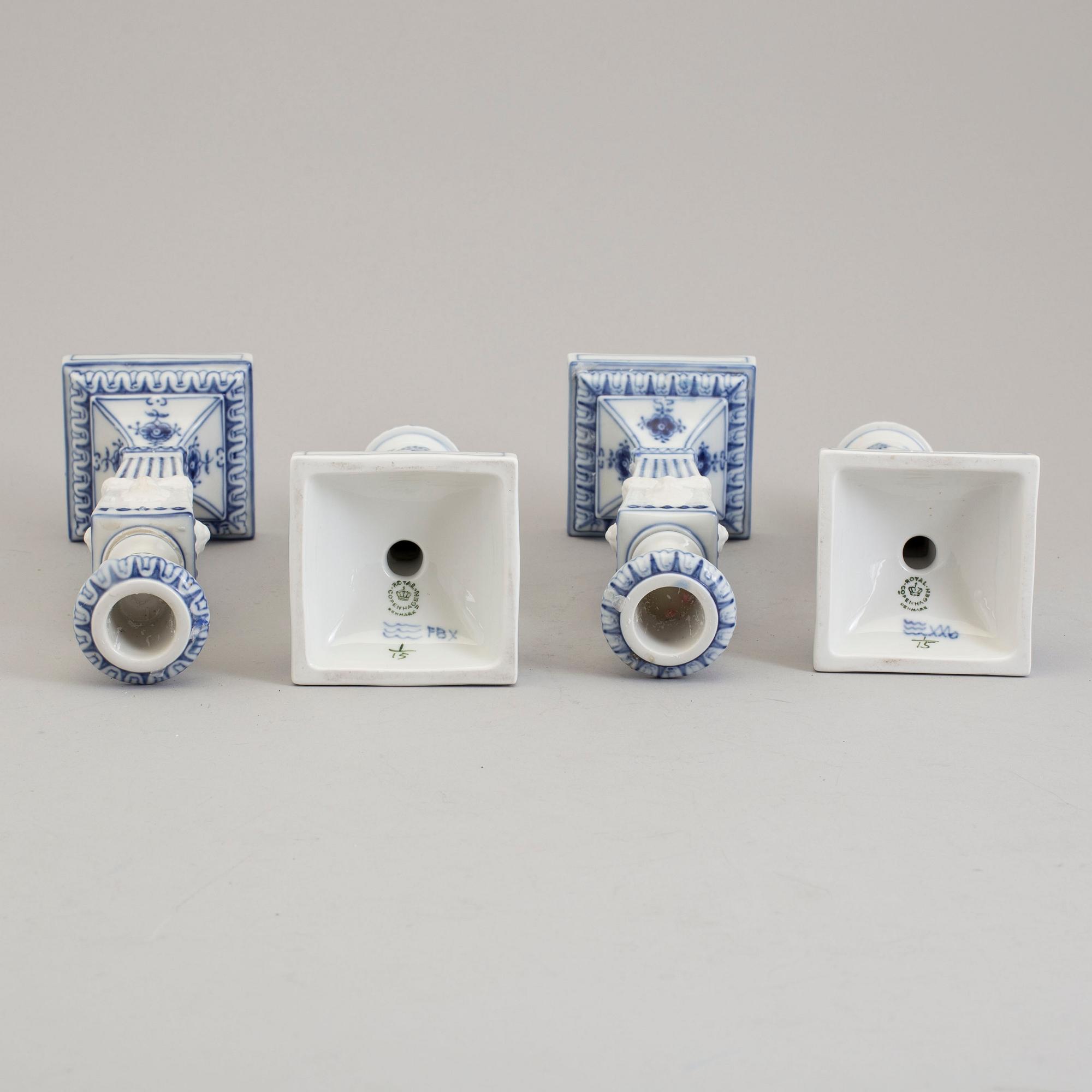 Two pairs of porcelain candlesticks by Royal Copenhagen, Denmark, third quarter of the 20th century.