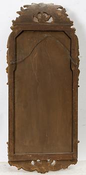 A gilt-gesso rococ-style mirror, 20th century.